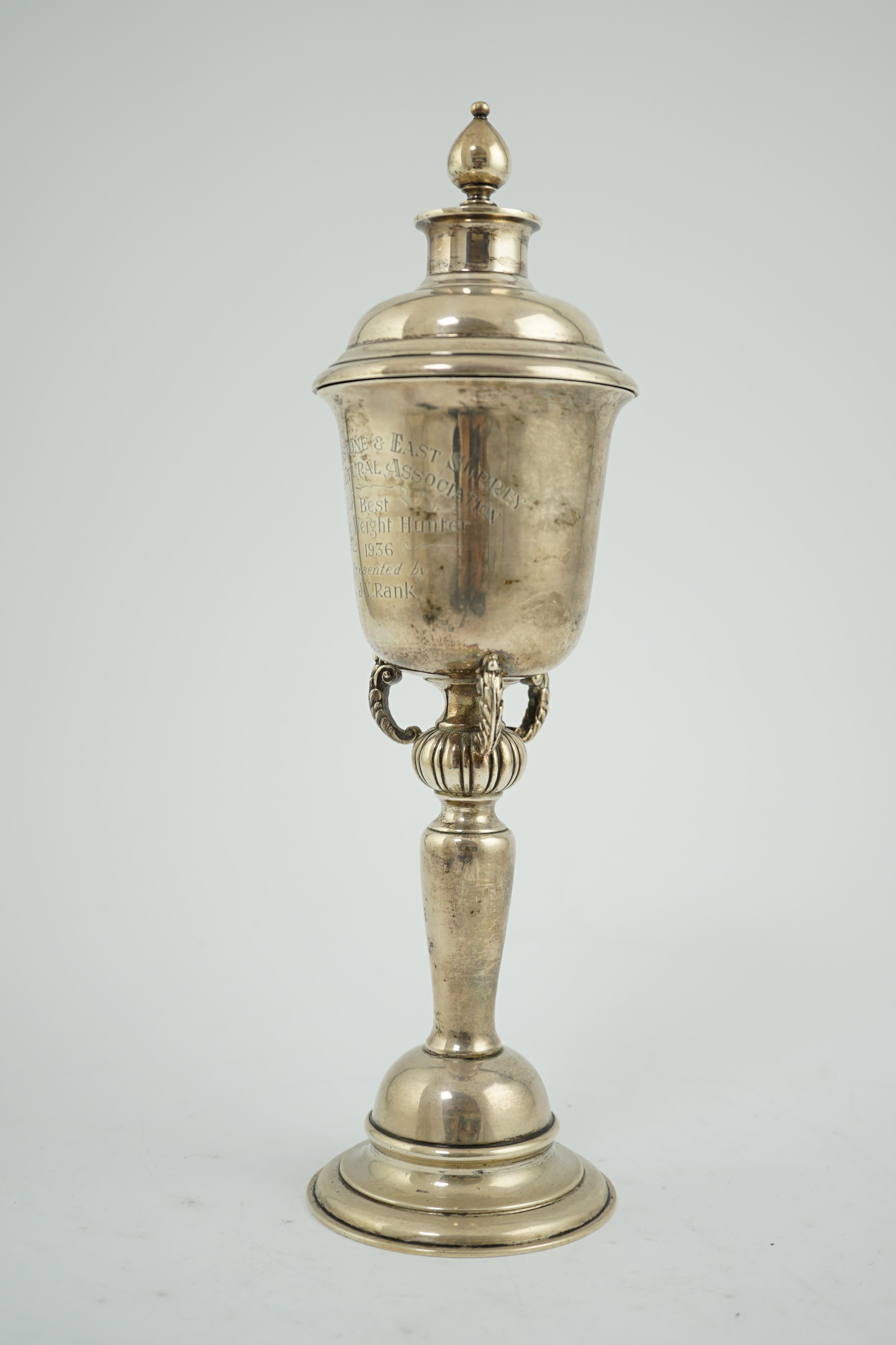 A George V silver presentation trophy cup and cover, by Goldsmiths & Silversmiths Co Ltd